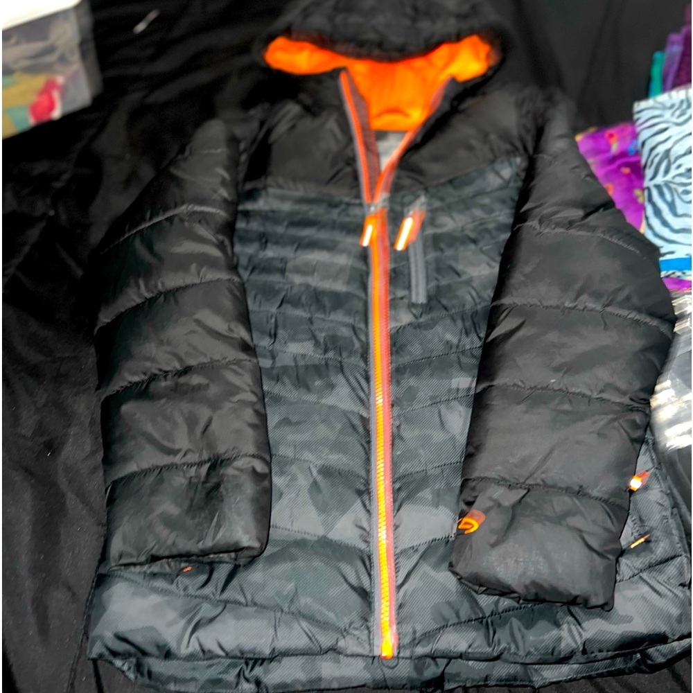 Boys slightly worn black winter coat. Size 8